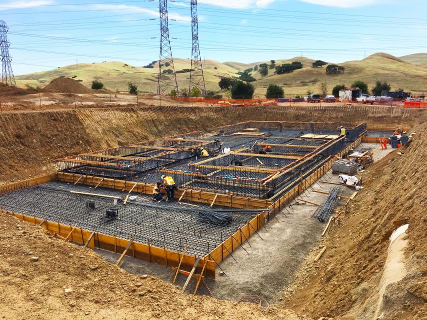 Dig site with building foundation set.